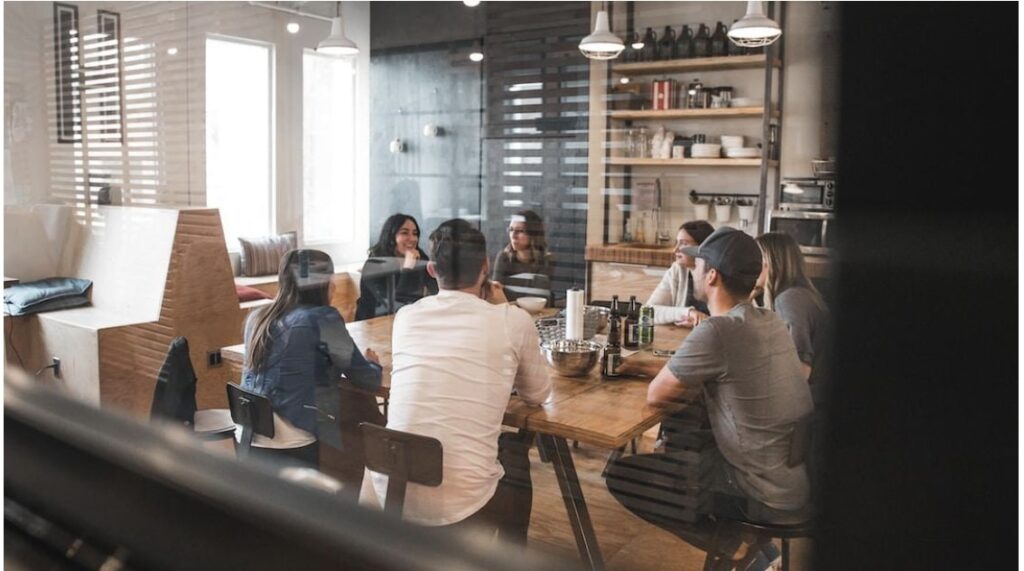 Conference meeting where employees are going over key components of a request for proposal
